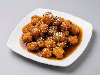 51A. Bola De Pollo Con Sésamo Y Miel