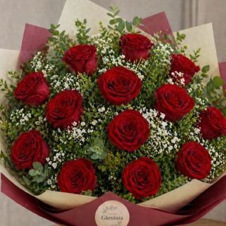 Rosas de docena de rojas