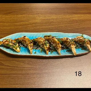 (18) Gyoza frita con salsa teriyaki