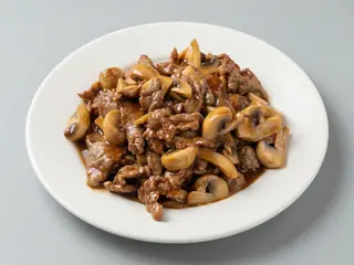 61. Ternera Con Champiñones
