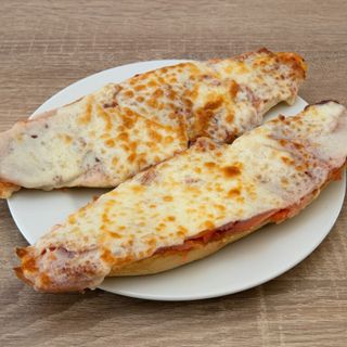 Entera serranita con jamon y queso manchego curado gratinado