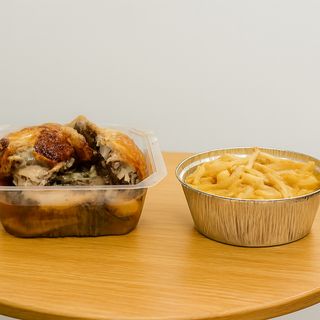 Pollo y ración de patatas