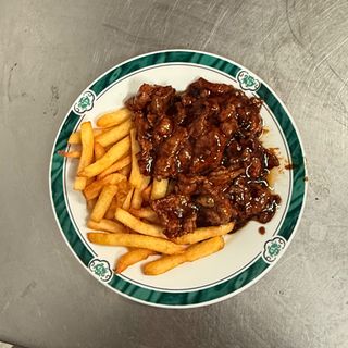 ternera con patatas fritas