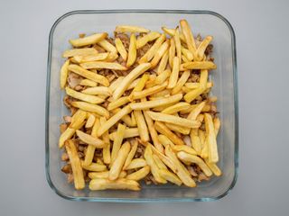 Ración De Patatas Con Carne