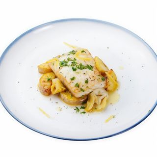 32. Bacalao Gratinado Al Sabor De Ajo Con Patatas Asadas