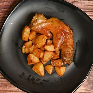 1/2 Pie de cerdo a la leña 