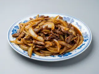 Ternera Con Cebolla