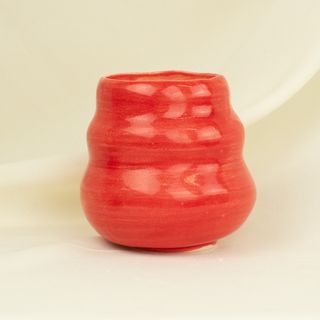 Vela triple onda roja Andrea Suárez