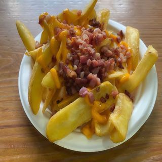 Patatas Teja Con Bacon Y Cheddar