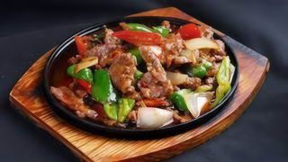 93. Cerdo En Salsa A La Plancha