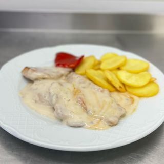 Medallones de solomillo ibérico con salsa de setas