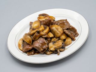 ternera con champiñones