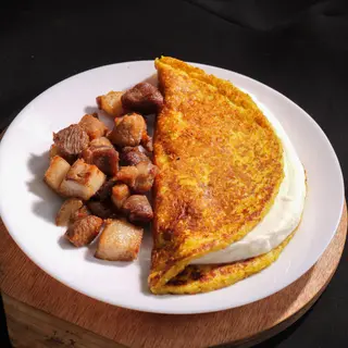 Cachapa con queso de mano y cochino frito