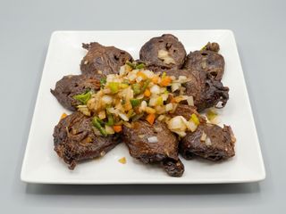 Cabeza De Pato A La Pimienta Y Sal 