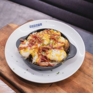 Patatas asadas gratinadas a la brasa