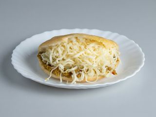Arepa A La Plancha De Carne Mechada Y Queso