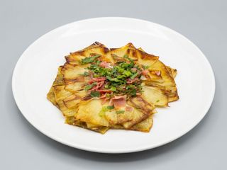 Alcachofa confitada con jamón