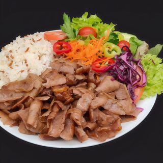 Plato Con Arroz Y Carne De Ternera