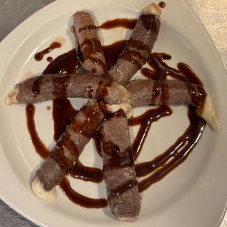 86. Rollitos de ternera con salsa teriyaki 