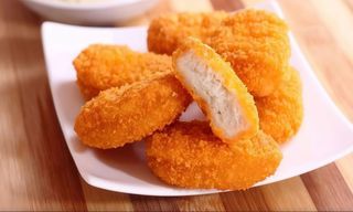 Nuggets De Pollo Con Papas Fritas (Ración)