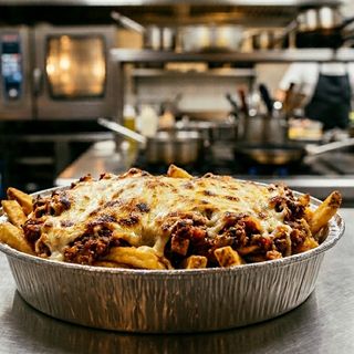 PATATAS  GRATINADAS A LA BOLOÑSESA