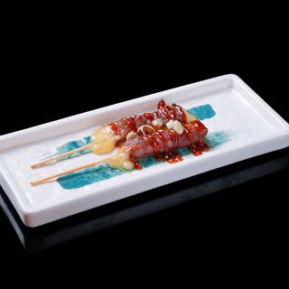 59. Yakitori De ternera con queso (3 Uds.)