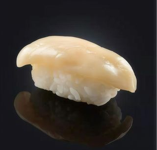 54- Nigiri pez mantequilla y trufa (3 pzs.)