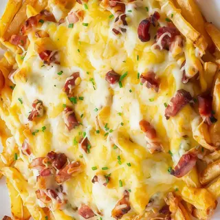 RACIÓN DE PATATAS RANCHERAS CON BACÓN/QUESO