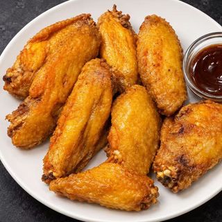 Alitas de pollo fritas (8 unidades)