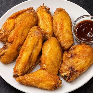 Alitas de pollo fritas ( 8 unidades)