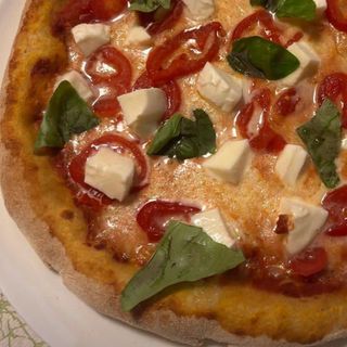 Pizza a tu gusto mediana 