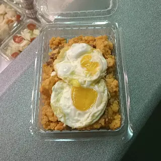 Patatas revolconas con huevo frito