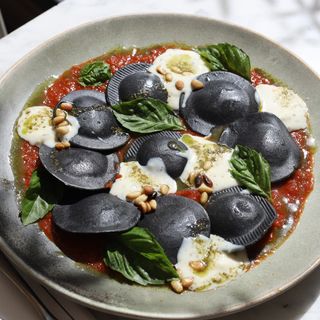 BLACK RAVIOLOS PARMIGGIANA