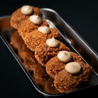 Croquetas de rabo con salsa de trufa