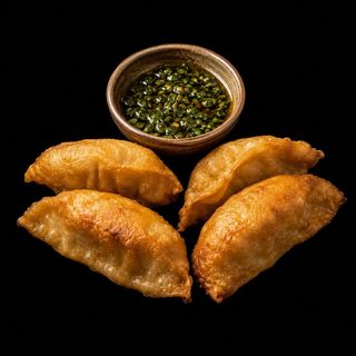 GYOZAS ESTILO ASADOR CON CHIMICHURRI (4unds)