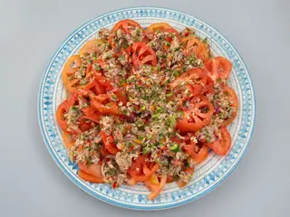 Ración de Tomates aliñados