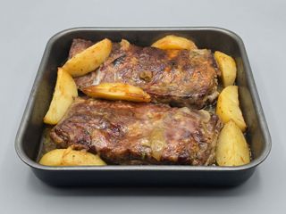 Costilla al horno con patatas