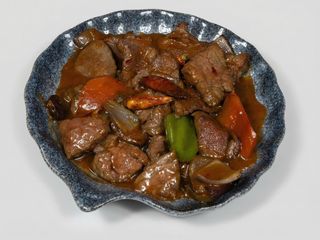 60.- Tiras de buey caramelizado