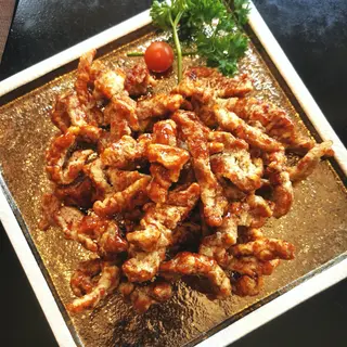 60.- Tiras de buey caramelizado
