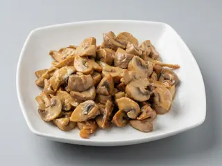 Champiñones al ajillo. ( 250 g)