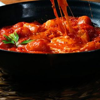 Ñoquis en salsa pomodoro gratinados