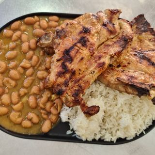 Chuleta De Cerdo,con Arroz y Menestra