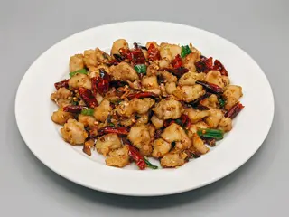 57. Pollo Con Salsa Picante