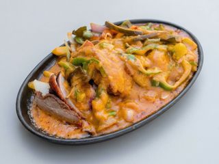 Pato con verduras al curry