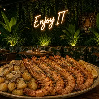 89. Parrillada de gambas Langostineras al Carbón con Patata Trufada