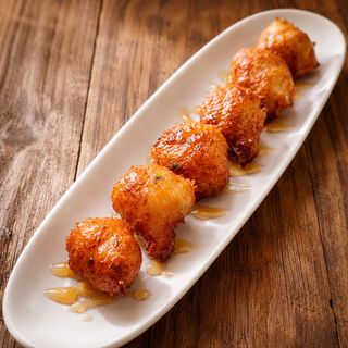 Buñuelos Crujientes de Bacalao y Miel (6 unidades)
