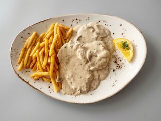 Escalope con salsa de champiñones