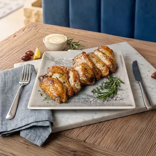 ALITAS DE POLLO CON SALSA A ELEGIR