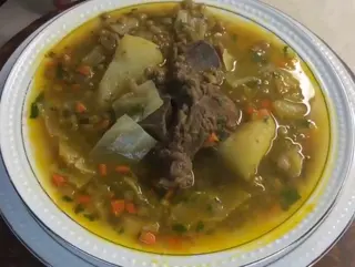 Caldo de lentejas con cerdo + arroz