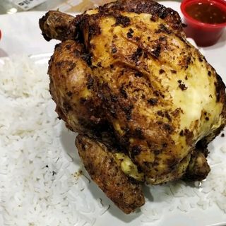 Pollo A L'Ast Entero Con Arroz